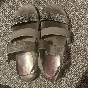 Tan and gold sandals